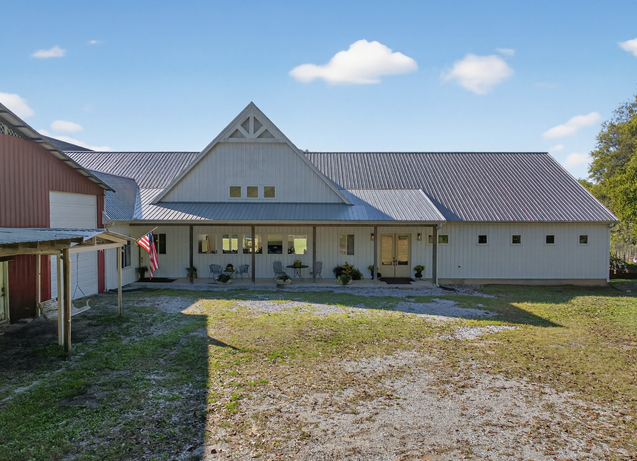 105 Mc Kinney Road Gordonsville, TN 38563 - Photo 81 of 91 a view of a big house with a big yard and large tree