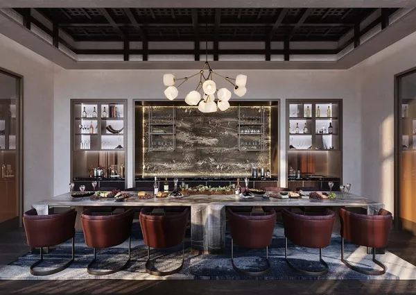 a room with table chairs and window