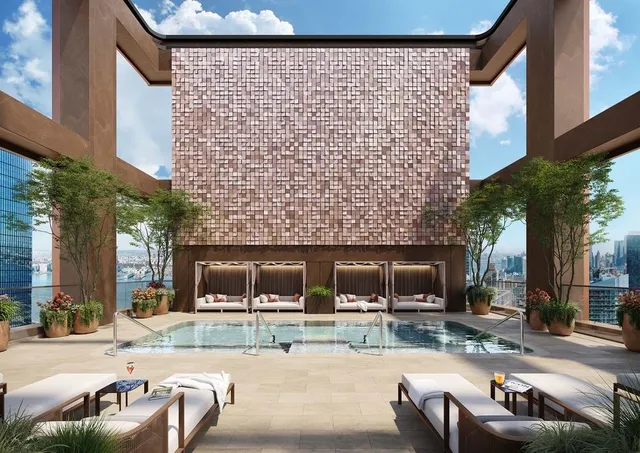 a view of a house with backyard porch and sitting area