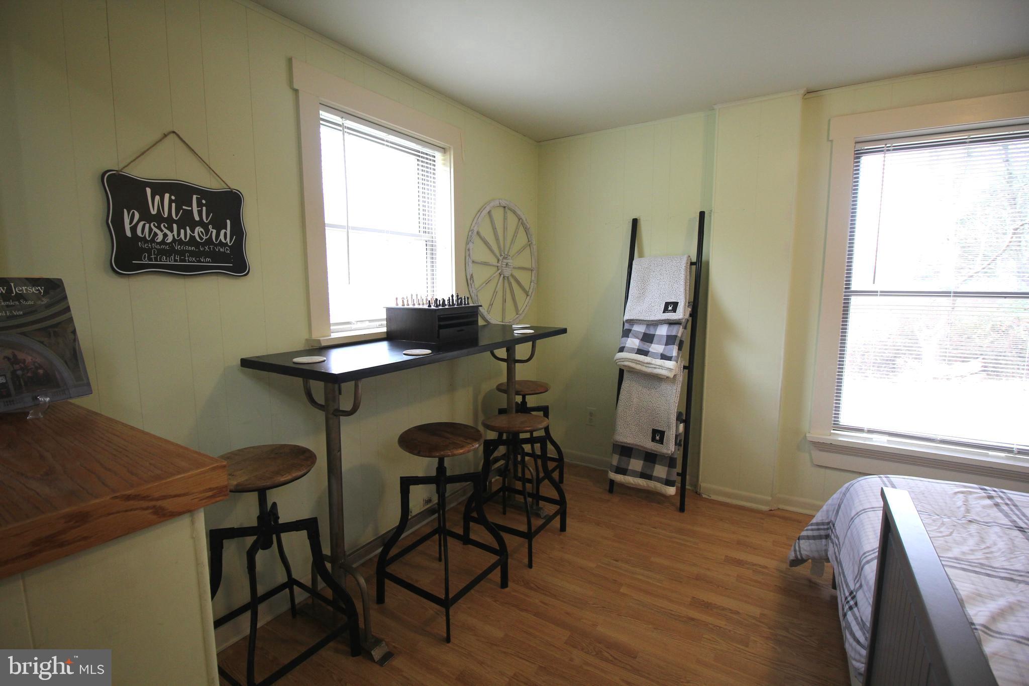 48 Poor Farm Road, Unit COTTAGE Pennington, NJ 08534 - Photo 16 of 34 a view of a workspace with furniture and a window