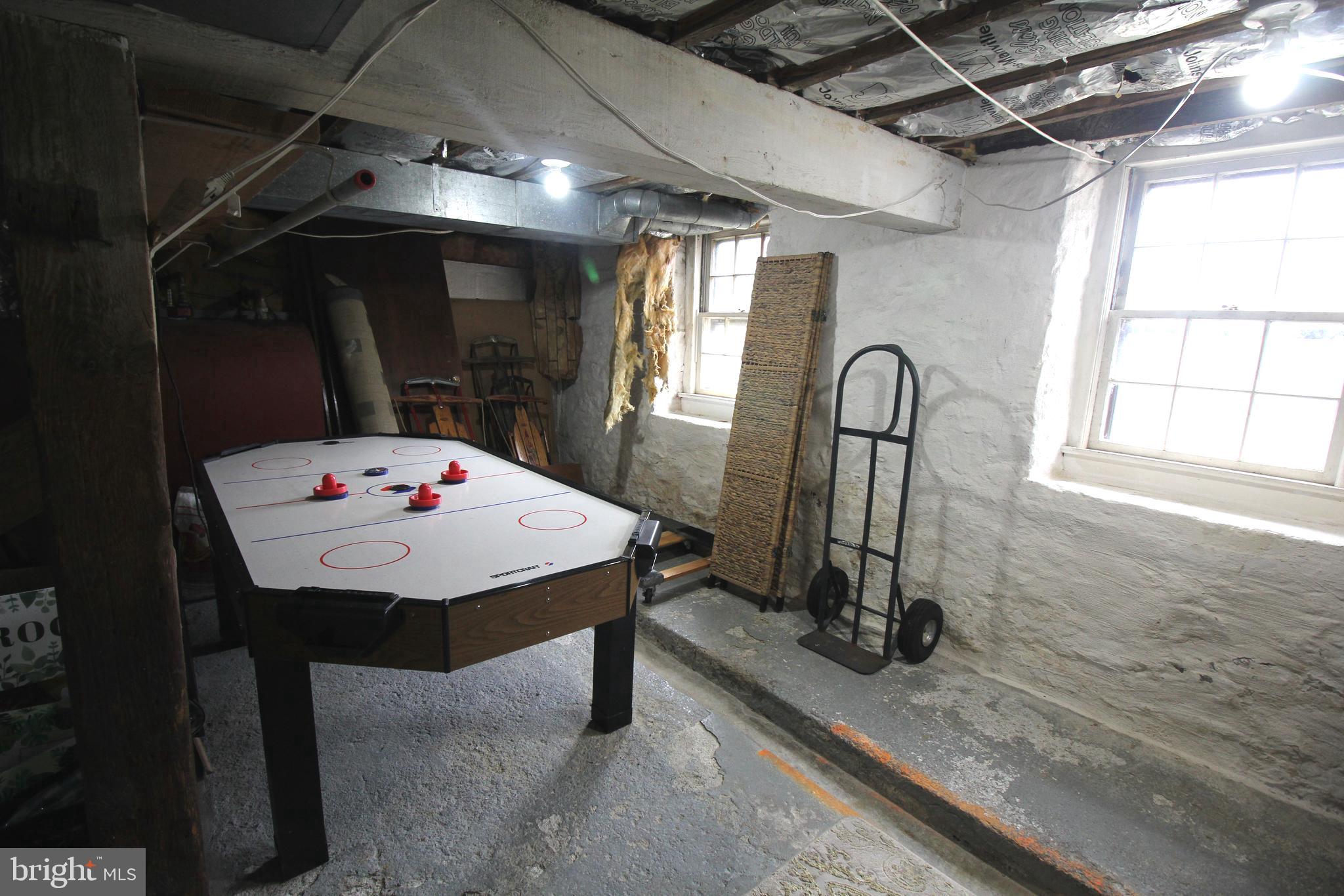 48 Poor Farm Road, Unit COTTAGE Pennington, NJ 08534 - Photo 28 of 34 a room with table chairs and a window