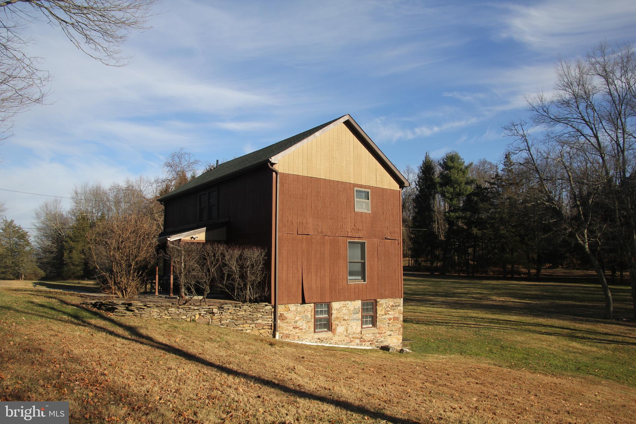 48 Poor Farm Road, Unit COTTAGE Pennington, NJ 08534 - Photo 3 of 34 a backyard of a house