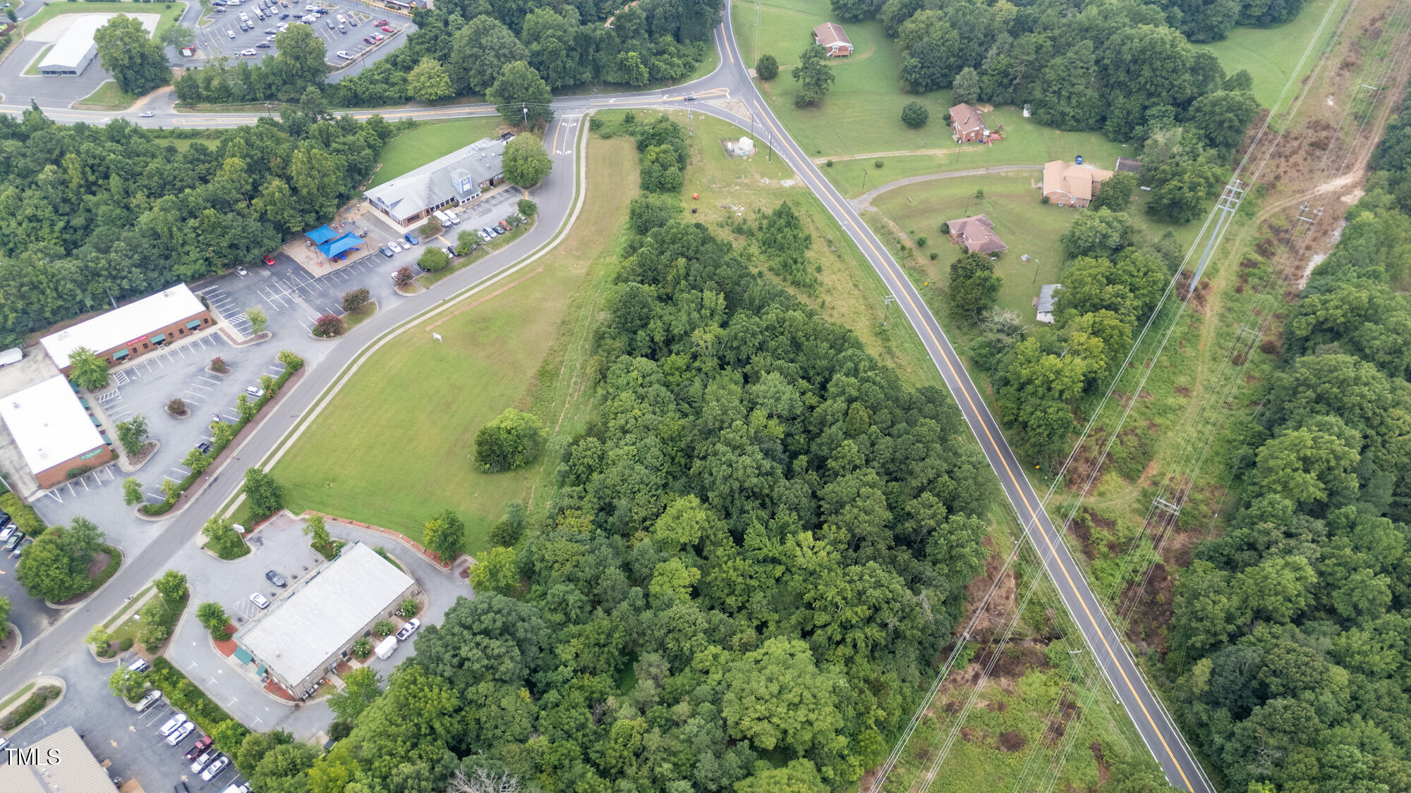 1600 Orange Grove Road Hillsborough, NC 27278 - Photo 11 of 14 an aerial view of a residential houses with outdoor space and street view