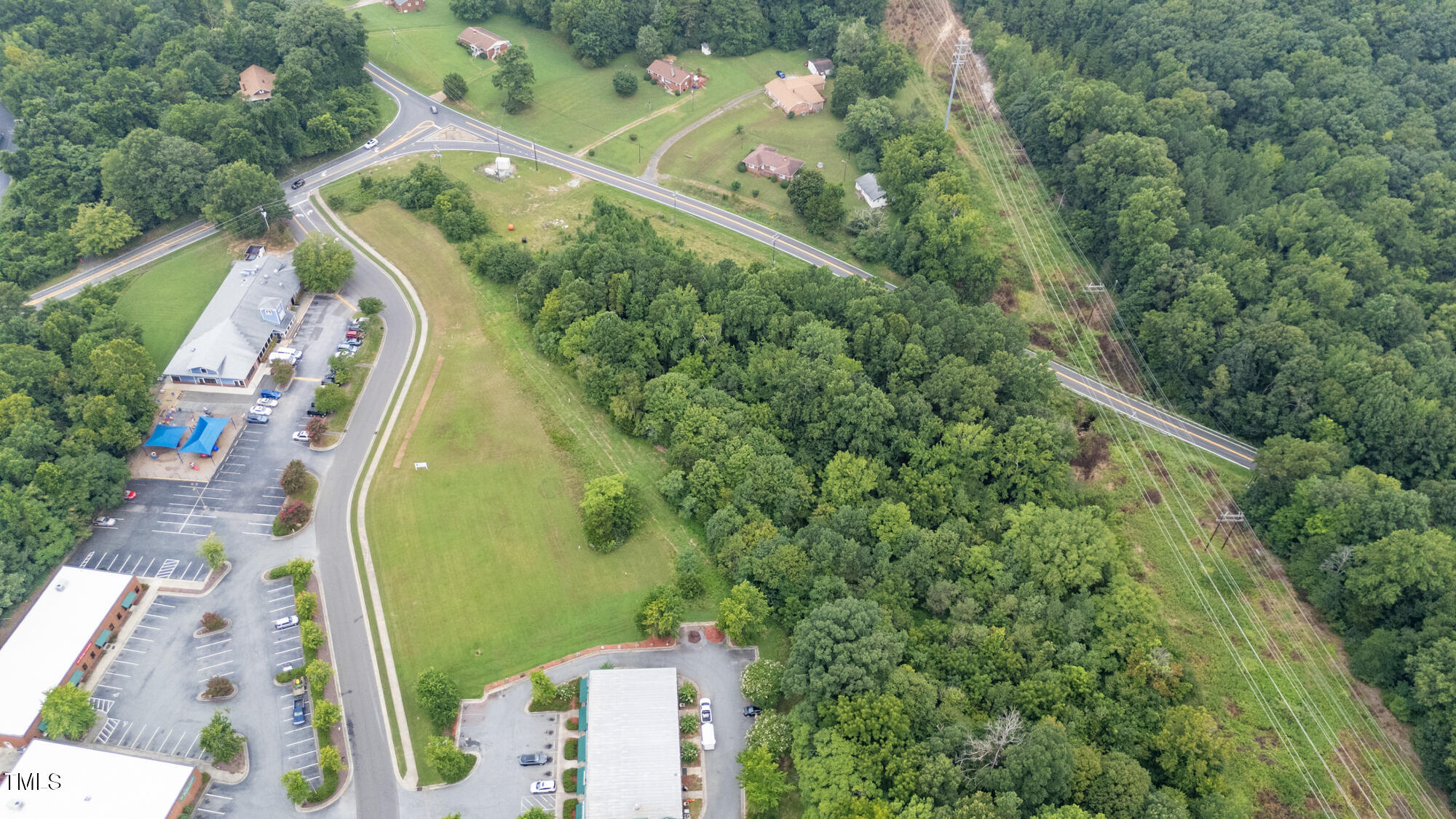 1600 Orange Grove Road Hillsborough, NC 27278 - Photo 12 of 14 an aerial view of a residential houses with outdoor space