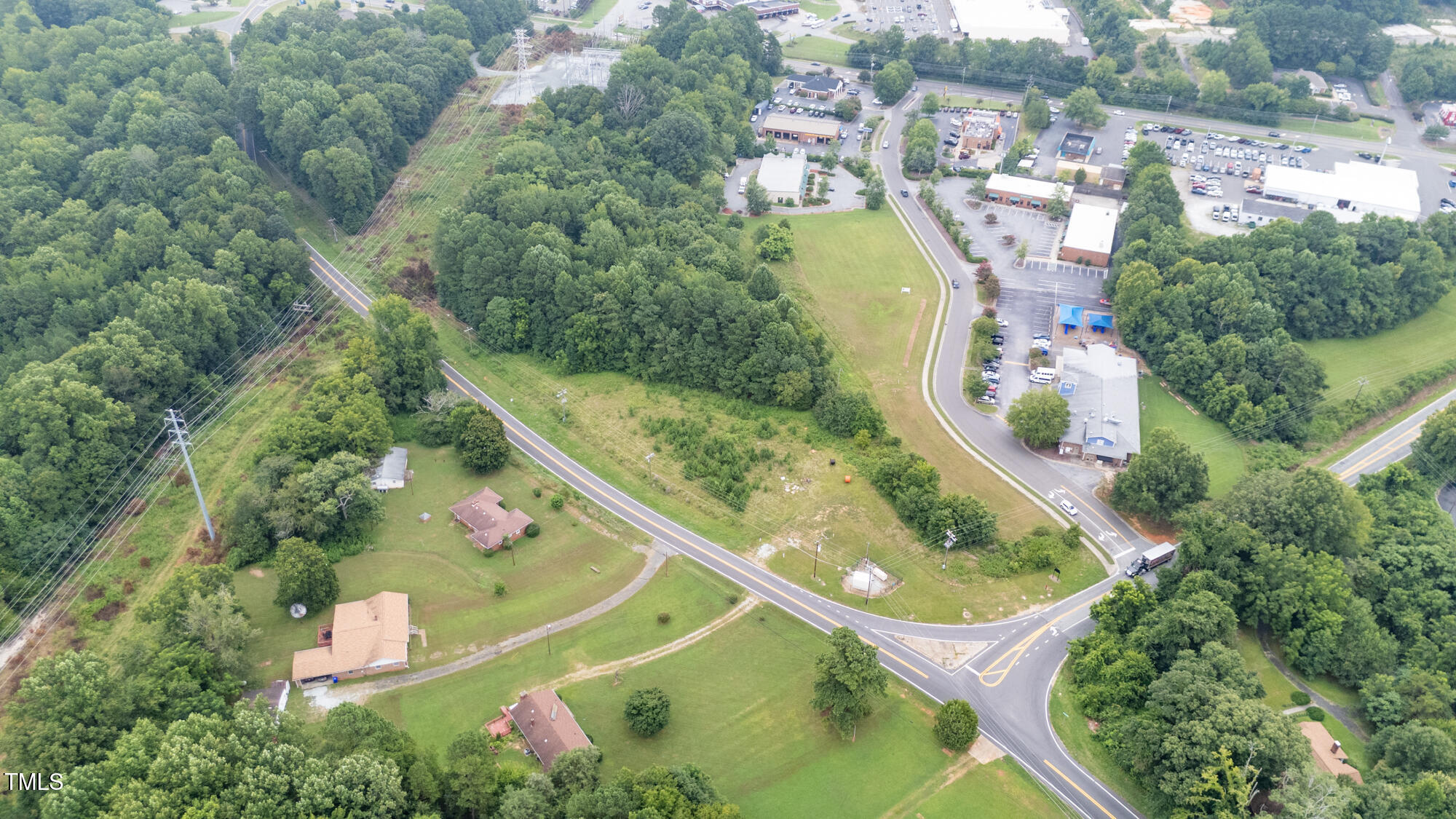 1600 Orange Grove Road Hillsborough, NC 27278 - Photo 4 of 14 an aerial view of residential house with outdoor space and swimming pool