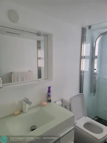 a bathroom with a sink and a toilet