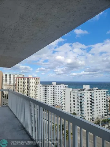 a view of balcony with roof