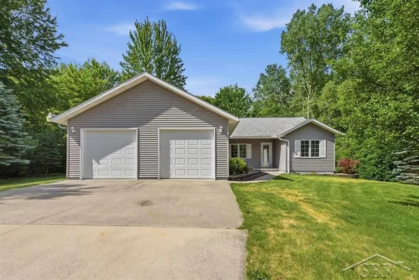 $335,000 | 1608 South Tomei Drive, Midland, MI 48640