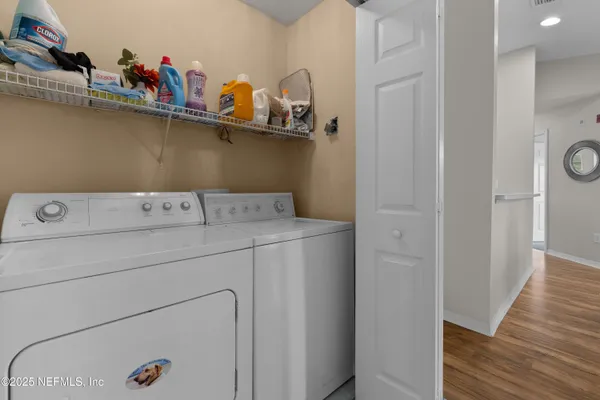 a utility room with dryer and washer