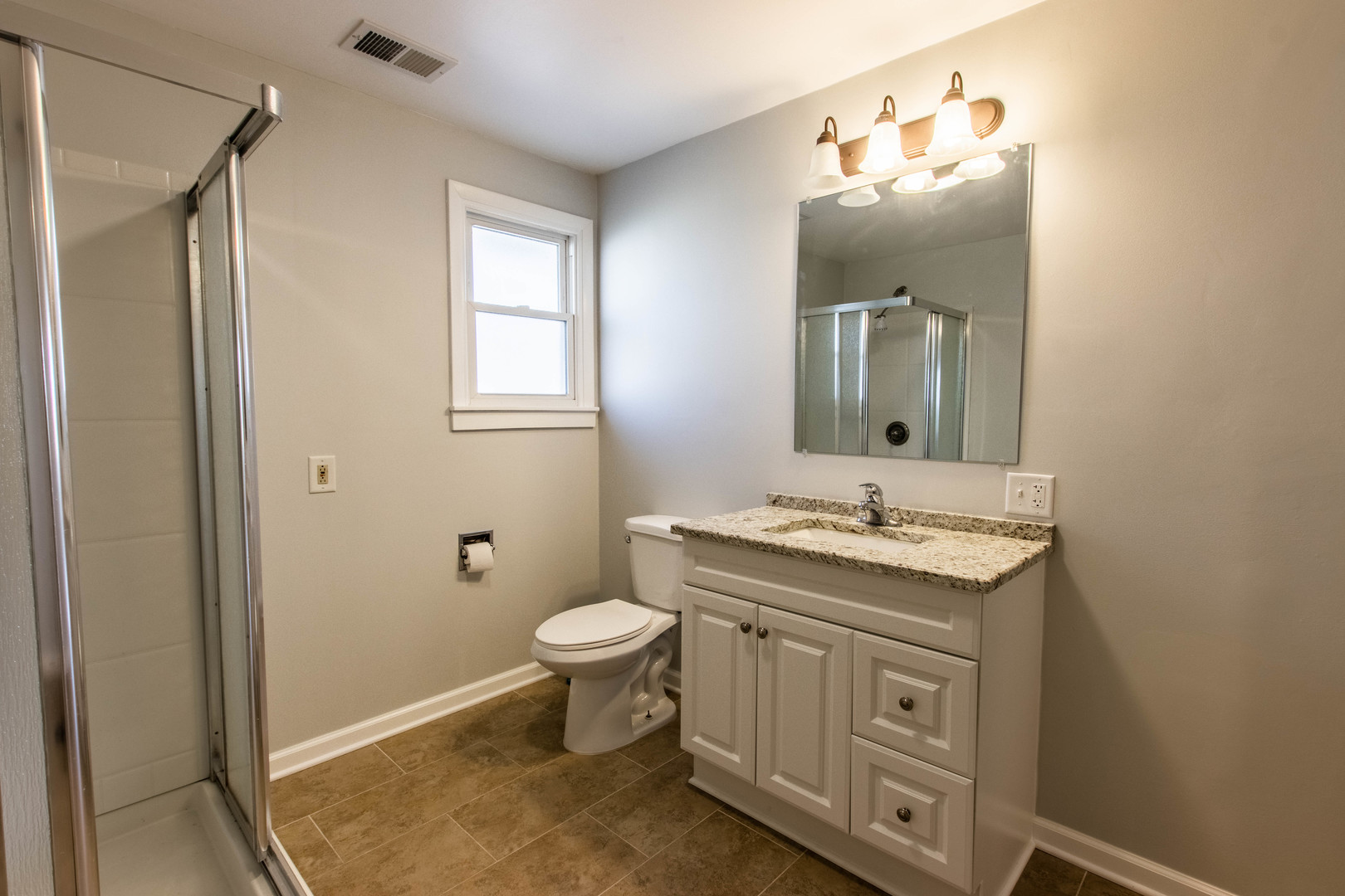 25955 South Tehle Road Elwood, IL 60421 - Photo 15 of 22 a bathroom with a granite countertop sink toilet and mirror