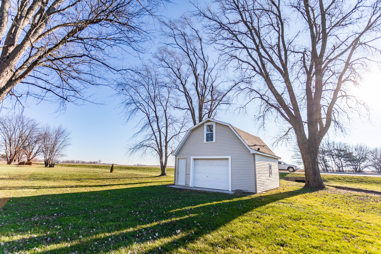 25955 South Tehle Road Elwood, IL 60421 - Photo 16 of 22 a front view of a house with a yard and large trees