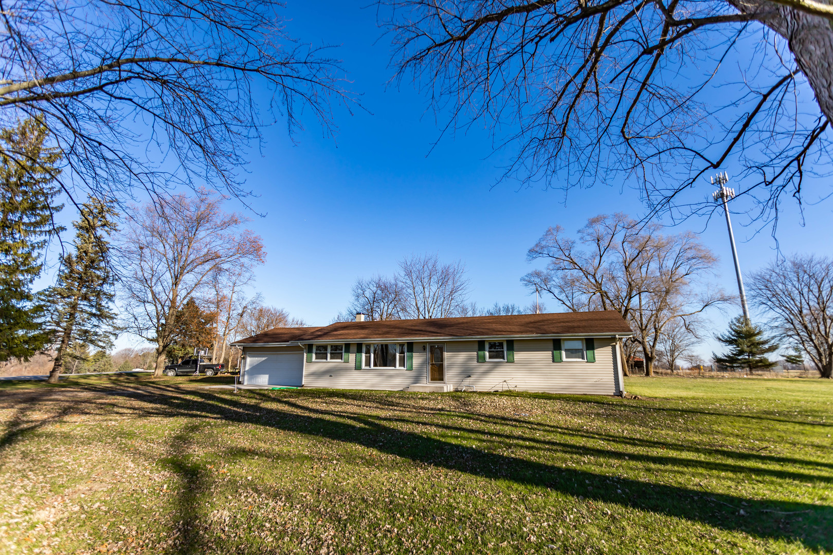 25955 South Tehle Road Elwood, IL 60421 - Photo 17 of 22 a front view of a house with a garden