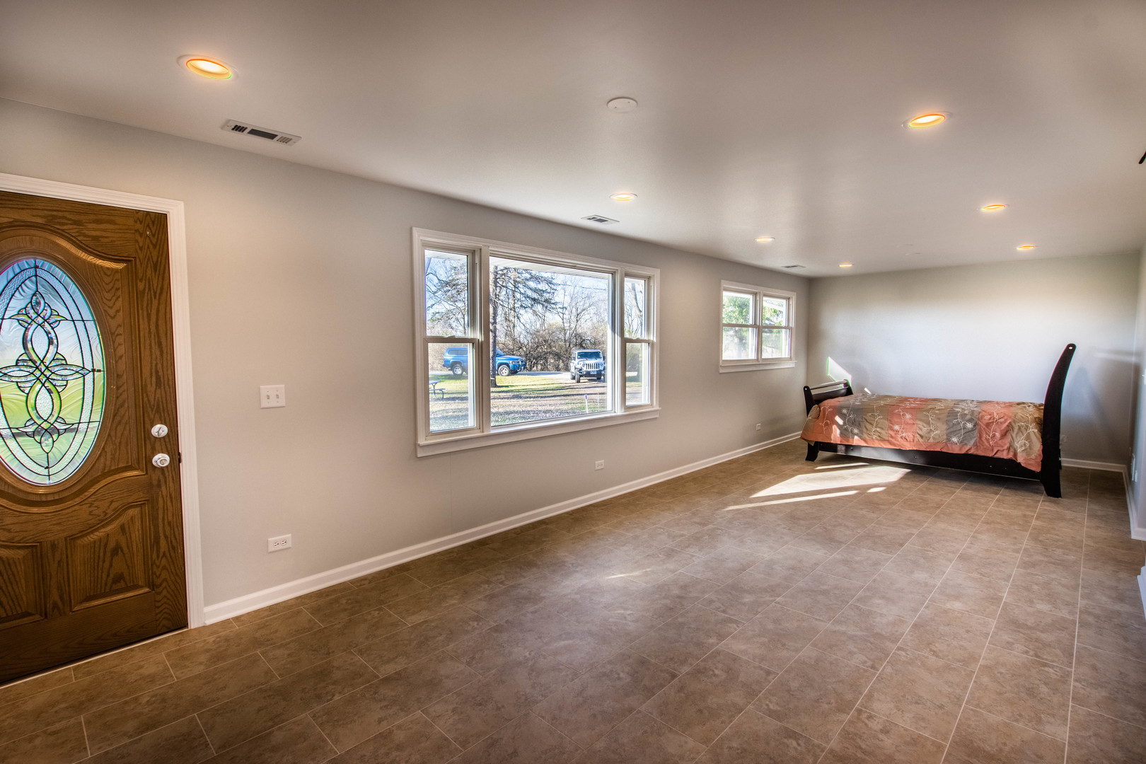 25955 South Tehle Road Elwood, IL 60421 - Photo 5 of 22 a big room with windows and cabinet