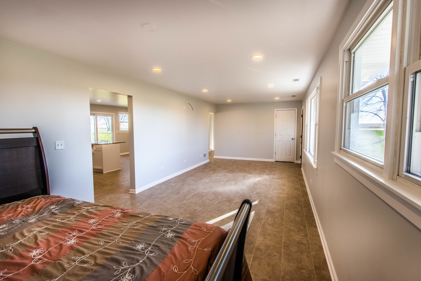 25955 South Tehle Road Elwood, IL 60421 - Photo 6 of 22 a view of a bedroom with wooden floor and windows