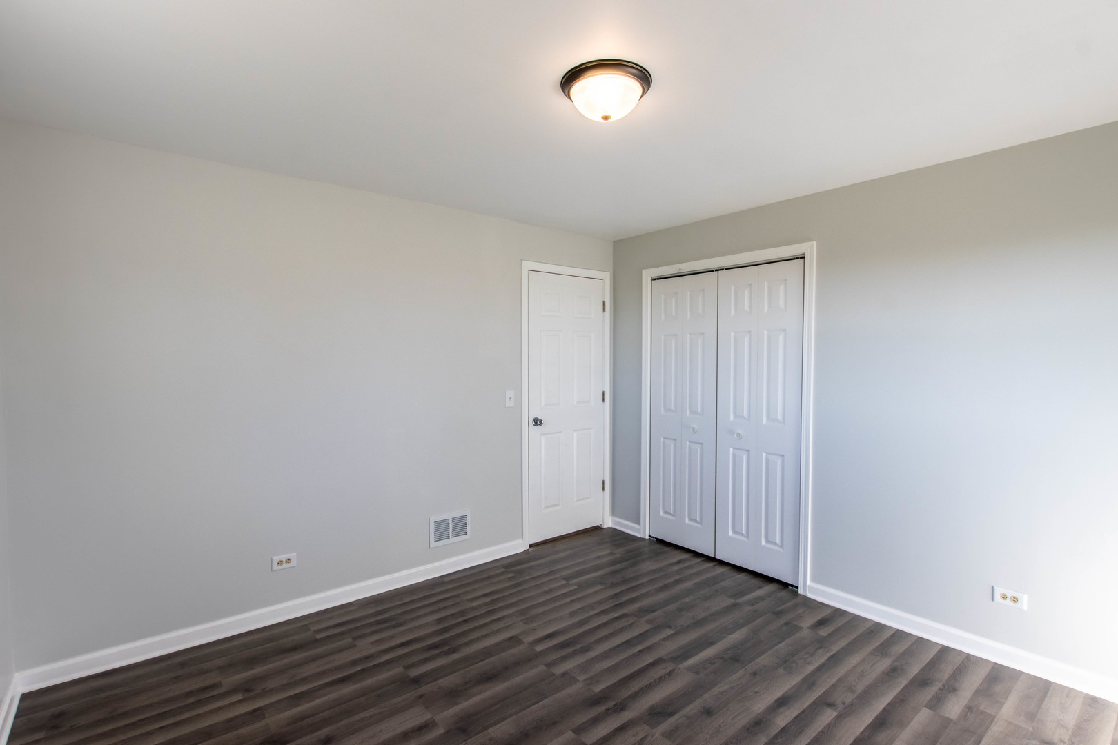 25955 South Tehle Road Elwood, IL 60421 - Photo 7 of 22 a view of an empty room with wooden floor