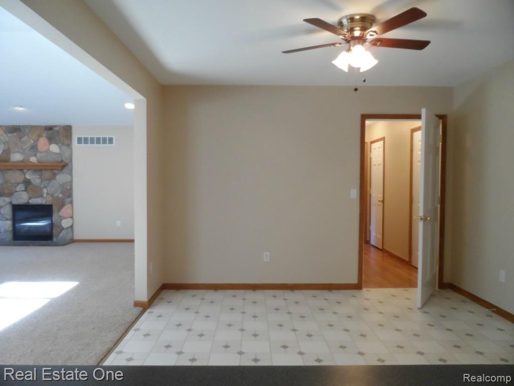 2684 Cole Road Lake Orion, MI 48362 - Photo 12 of 31 Dining area off Kitchen. Hall leads to 4th BR & Laundry