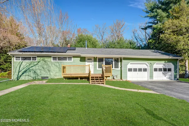 a view of house with outdoor space area