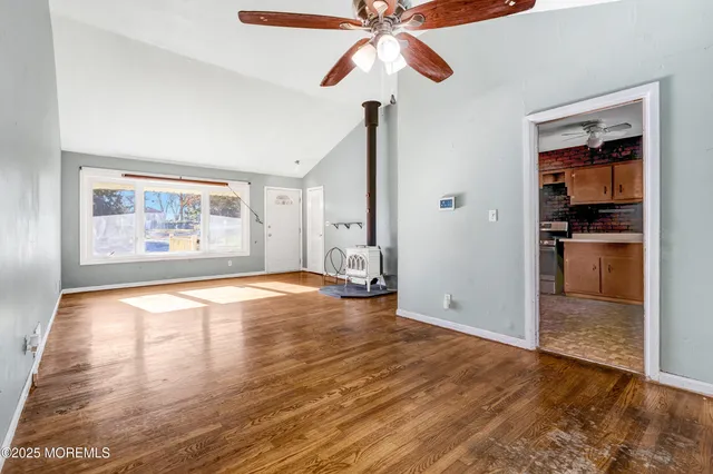 a kitchen with stainless steel appliances granite countertop a sink and a cabinets