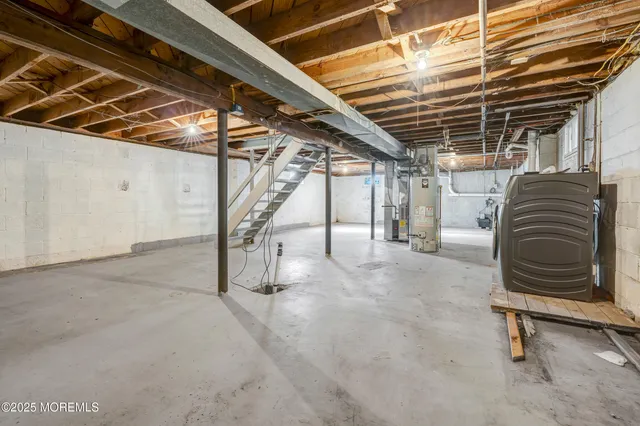 a view of a patio with table and chairs