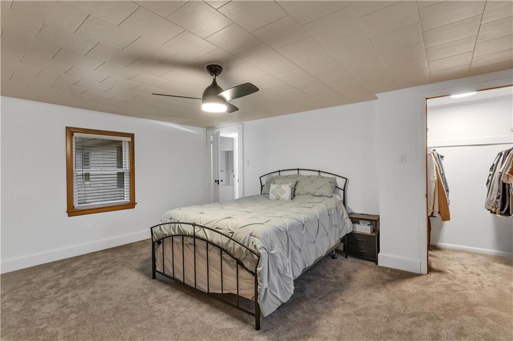 156 Manor Road Delmont, PA 15626 - Photo 22 of 32 Master Bedroom with Newer Carpet and Lighted Walk in Closet.