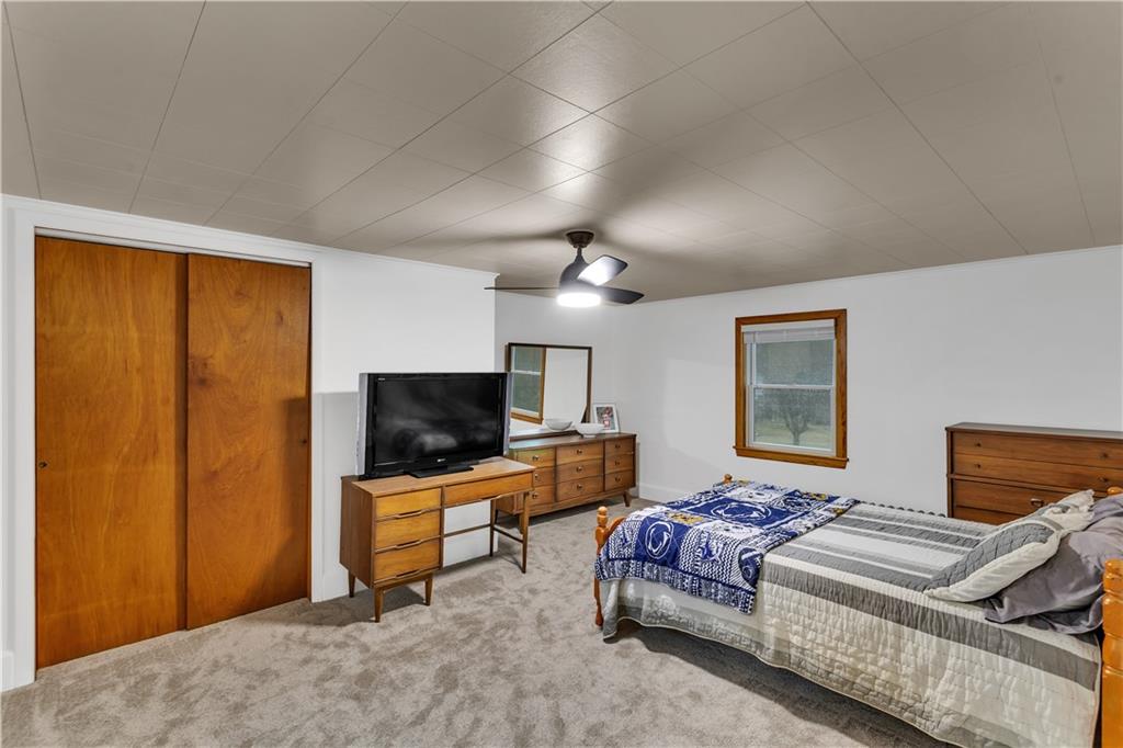 156 Manor Road Delmont, PA 15626 - Photo 23 of 32 2nd Bedroom 17x13, Upper Level with Double Closet and Ceiling Fan.