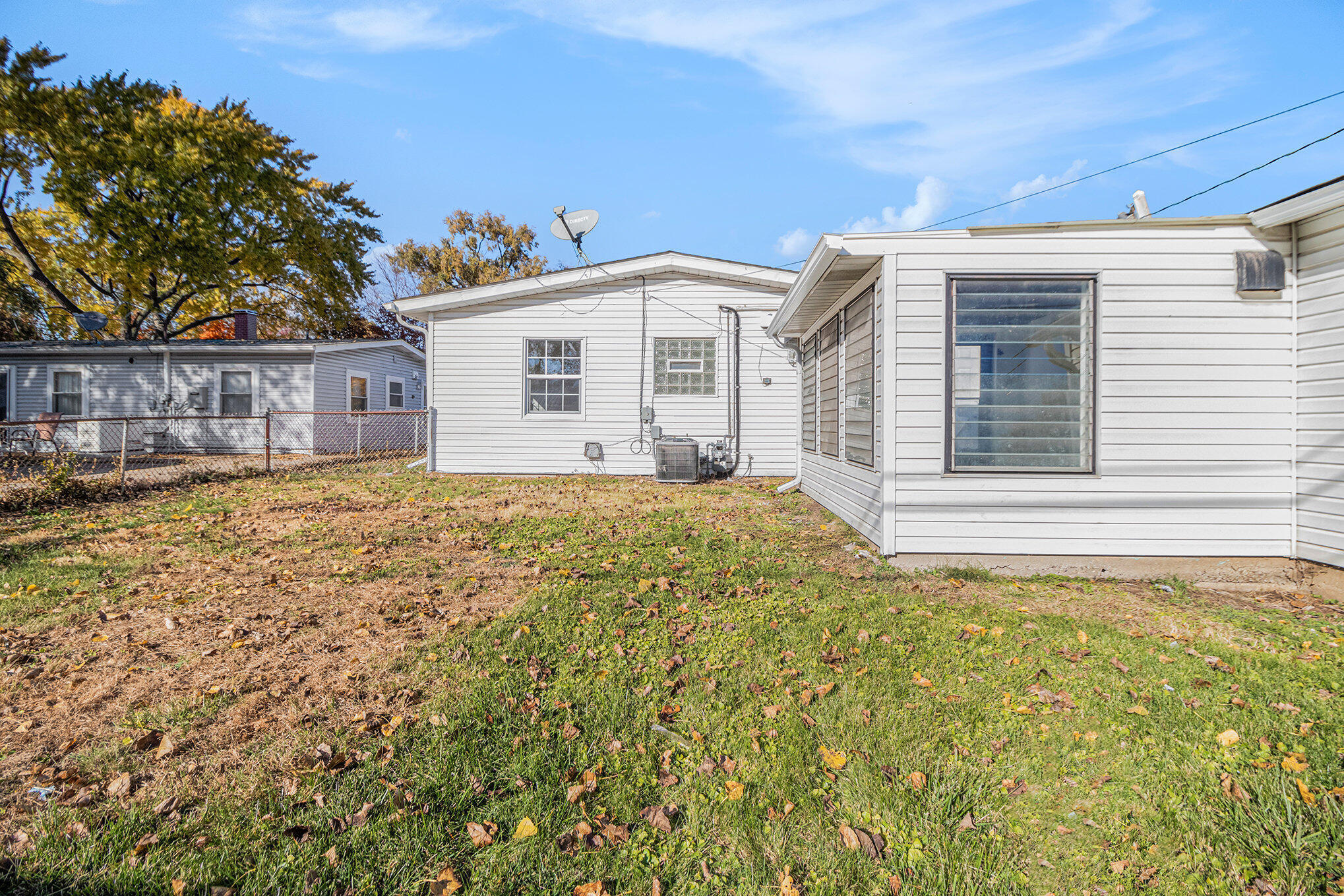 3336 175th Street Hammond, IN 46323 - Photo 11 of 14 a view of a house with a yard