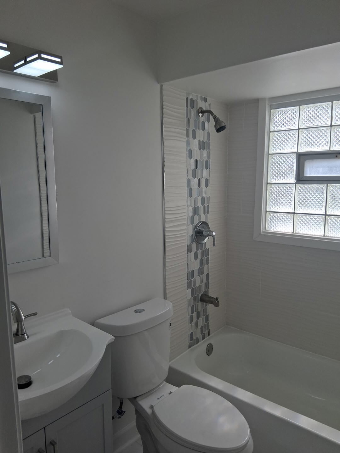 3336 175th Street Hammond, IN 46323 - Photo 12 of 14 a bathroom with a sink toilet and shower