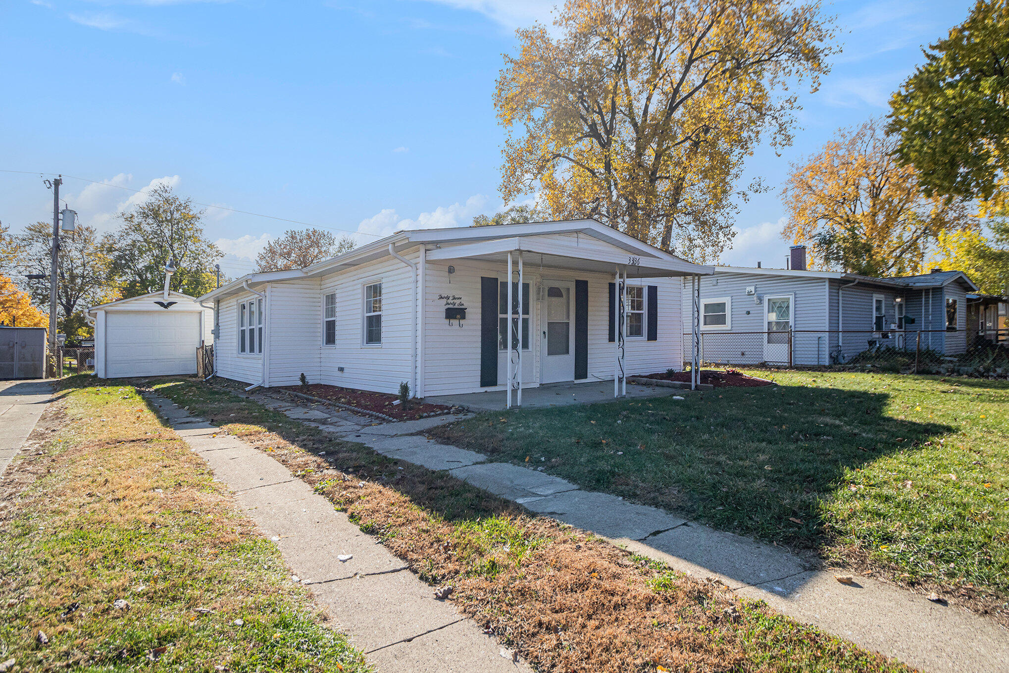 3336 175th Street Hammond, IN 46323 - Photo 13 of 14 a view of a house with a backyard