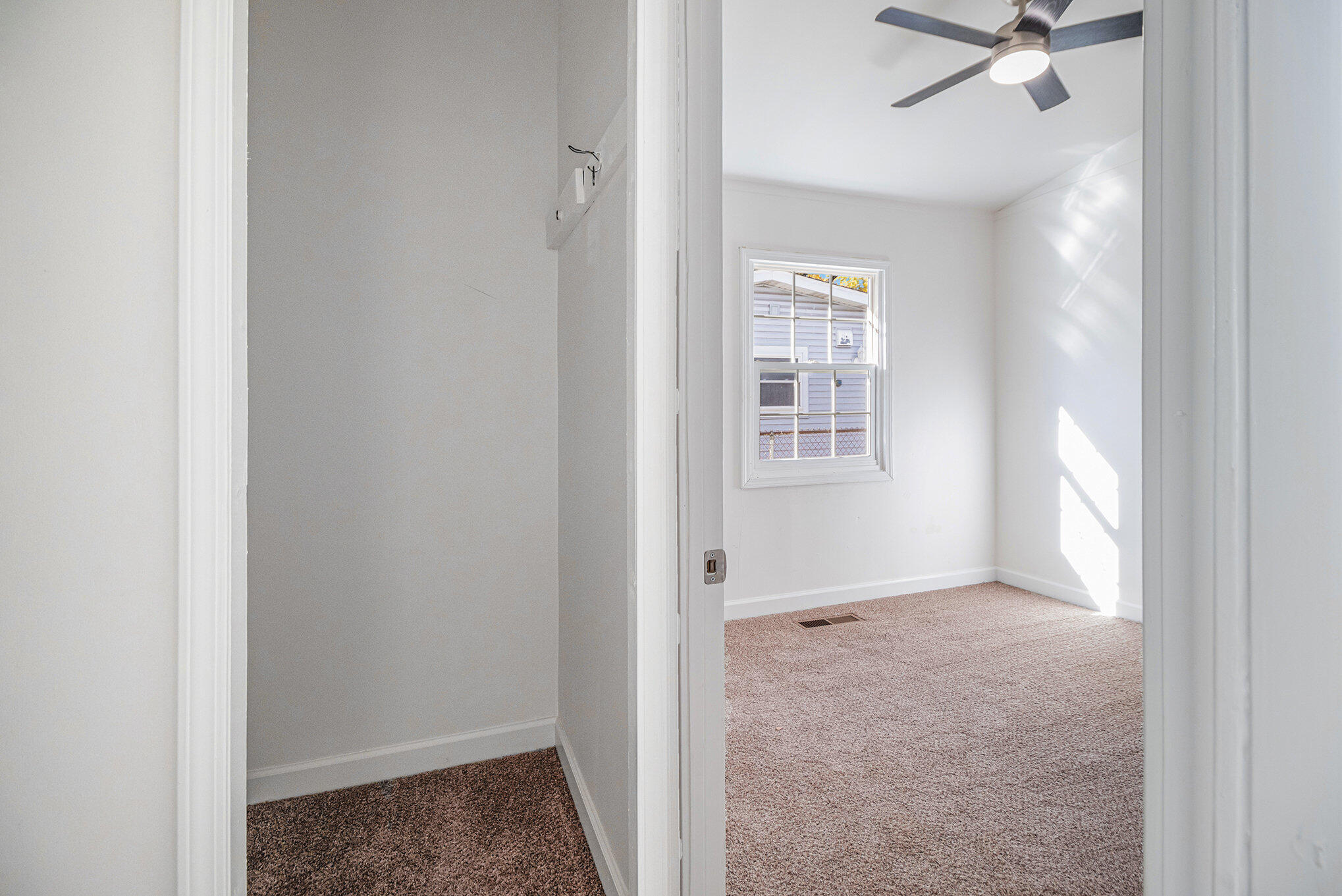 3336 175th Street Hammond, IN 46323 - Photo 6 of 14 a view of an empty room with a window