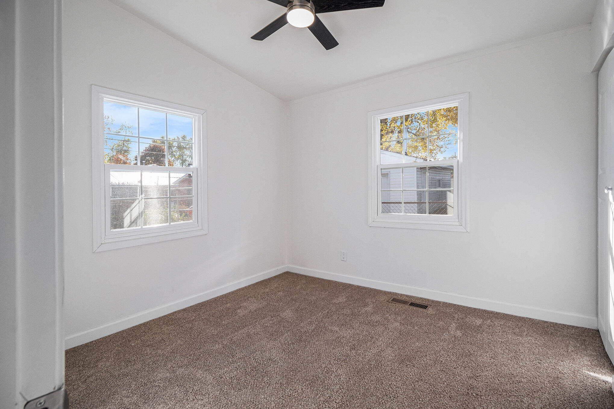 3336 175th Street Hammond, IN 46323 - Photo 7 of 14 a view of an empty room with a window