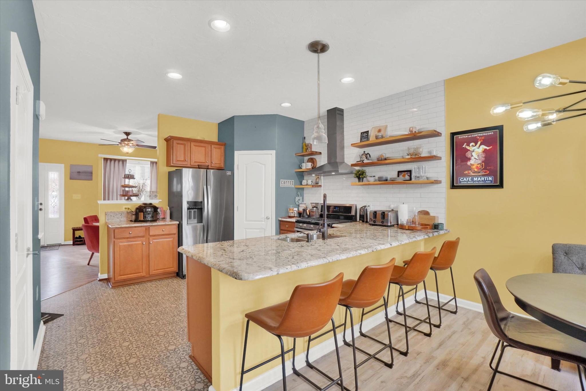 2411 Schultz Way, Unit 37 York, PA 17402 - Photo 12 of 32 a large kitchen with a table and chairs in it