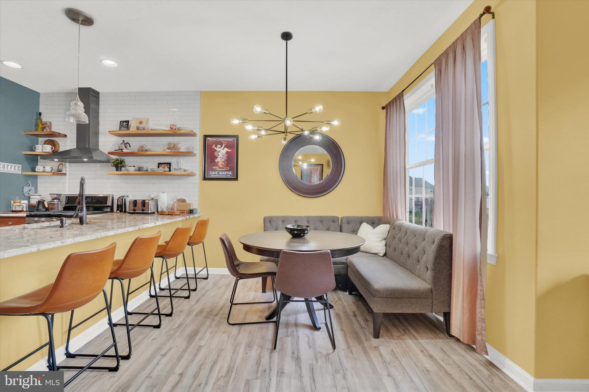 2411 Schultz Way, Unit 37 York, PA 17402 - Photo 13 of 32 a view of a dining room with furniture and a chandelier