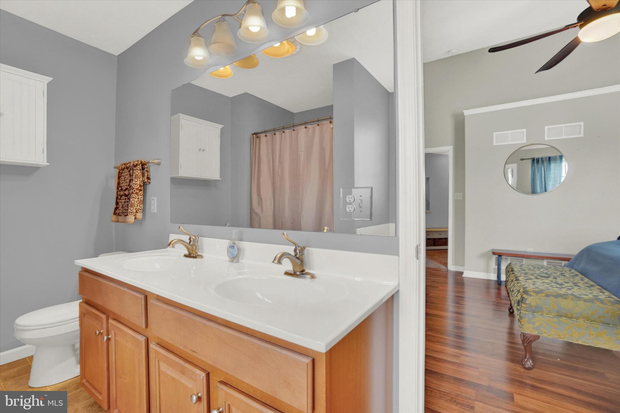 2411 Schultz Way, Unit 37 York, PA 17402 - Photo 22 of 32 a bathroom with a sink and a mirror