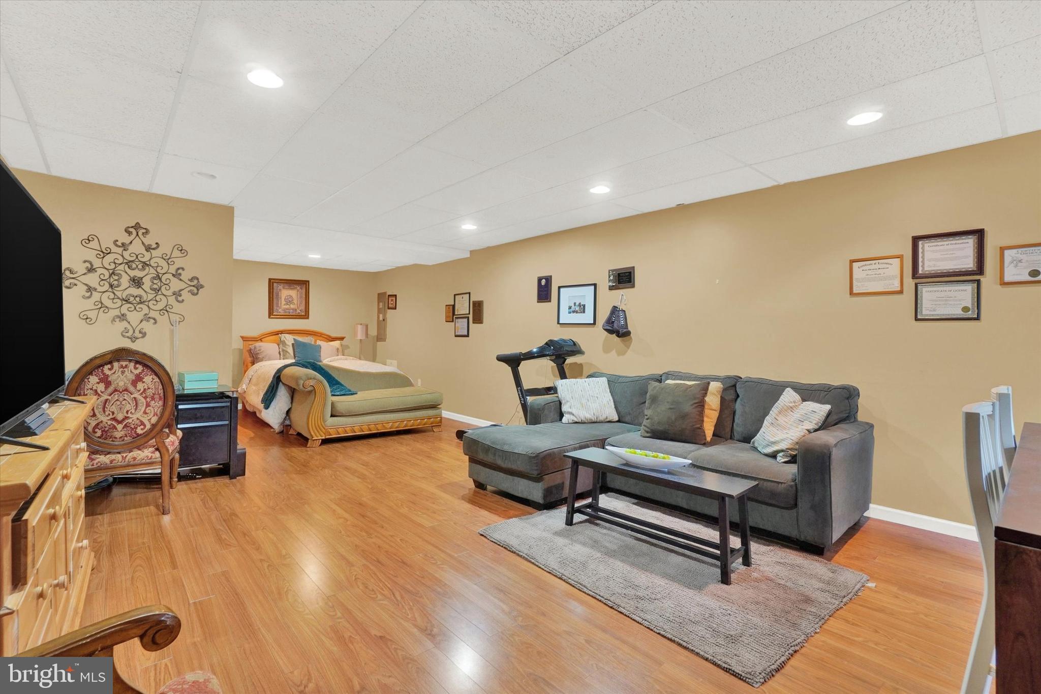 2411 Schultz Way, Unit 37 York, PA 17402 - Photo 23 of 32 a living room with furniture a rug and a table