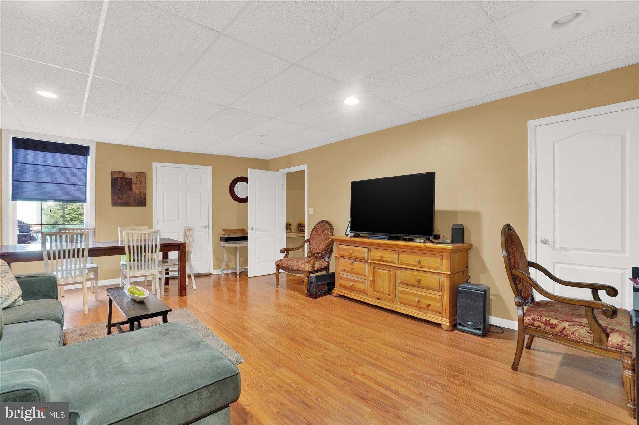 2411 Schultz Way, Unit 37 York, PA 17402 - Photo 25 of 32 a living room with furniture and a flat screen tv