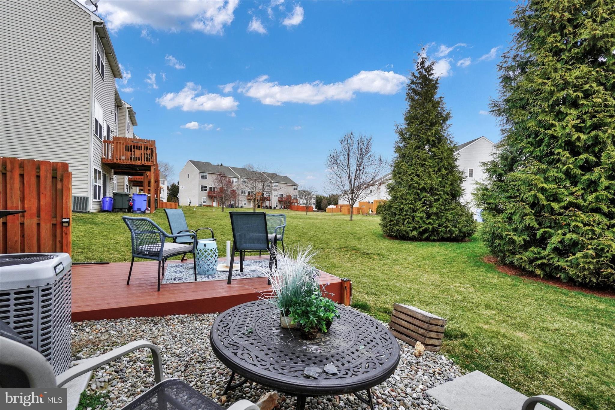 2411 Schultz Way, Unit 37 York, PA 17402 - Photo 29 of 32 a view of a chairs and table in backyard