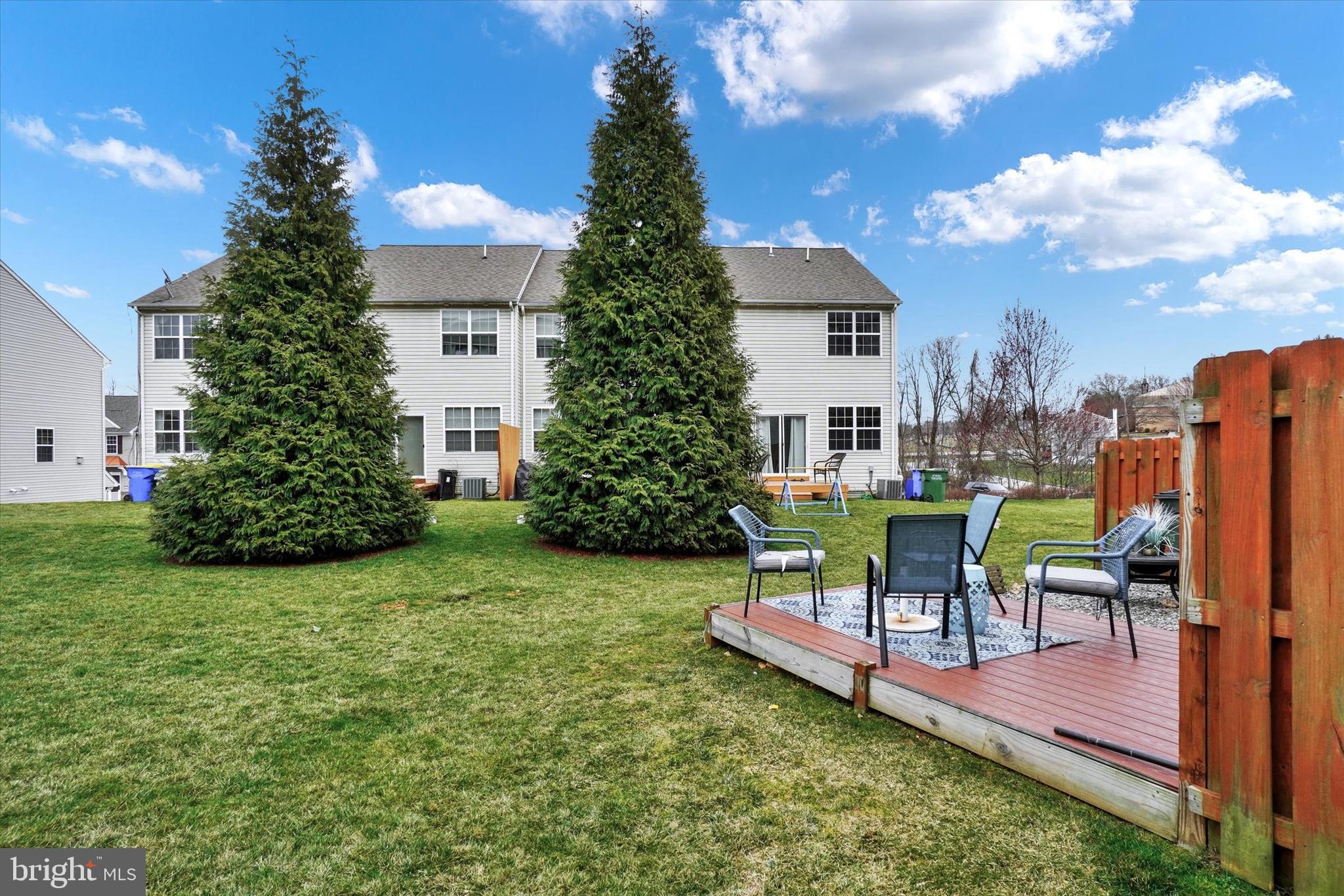 2411 Schultz Way, Unit 37 York, PA 17402 - Photo 30 of 32 a view of a house with backyard sitting area and garden
