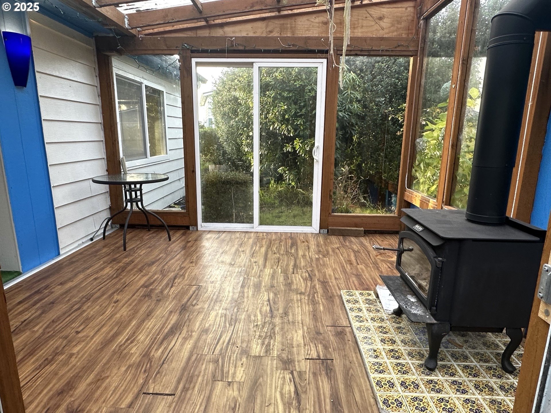 1601 Rhododendron Drive, Unit 572 Florence, OR 97439 - Photo 31 of 31 a view of a room with wooden floor and a balcony