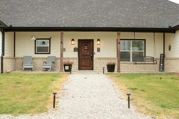 a view of a house with a swimming pool