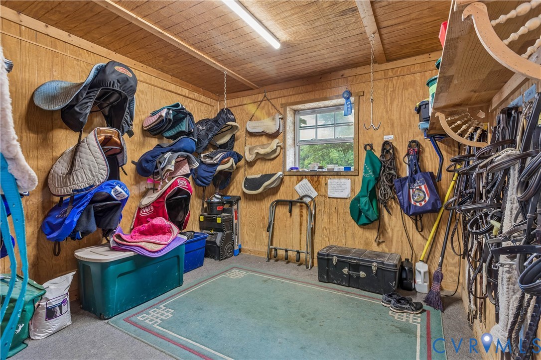 2016 Forge Road Toano, VA 23168 - Photo 17 of 99 Dedicated tack room featuring plywood paneling, a