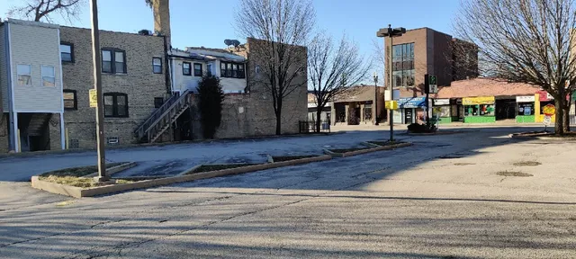 a front view of a building with street view
