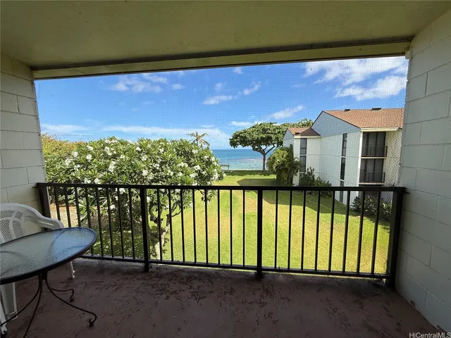 a view of a balcony with lake view