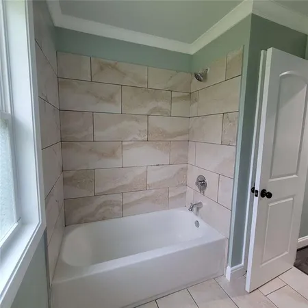 a bathroom with a bathtub