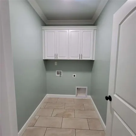 a view of room with cabinets