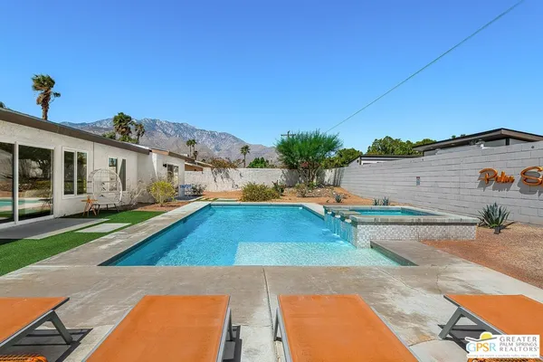 a view of a yard with a patio