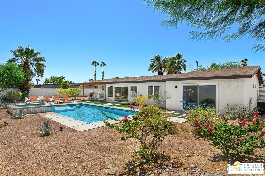2864 East Valencia Road Palm Springs, CA 92262 - Photo 18 of 31 a front view of a house with garden