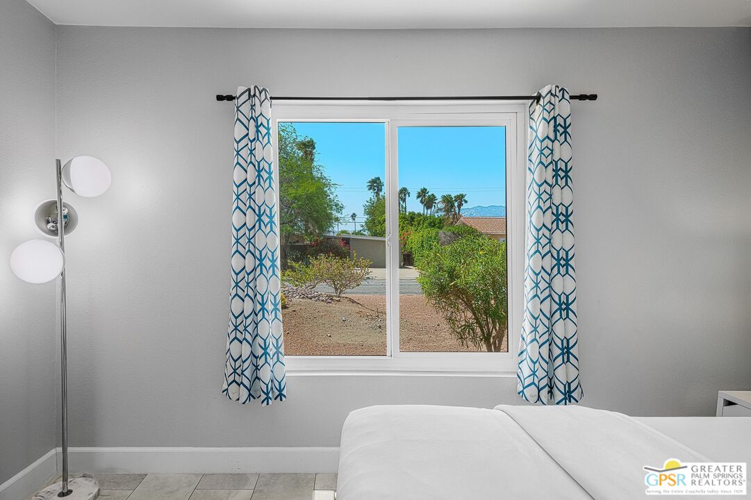 2864 East Valencia Road Palm Springs, CA 92262 - Photo 28 of 31 a bathroom with a bathtub and a shower