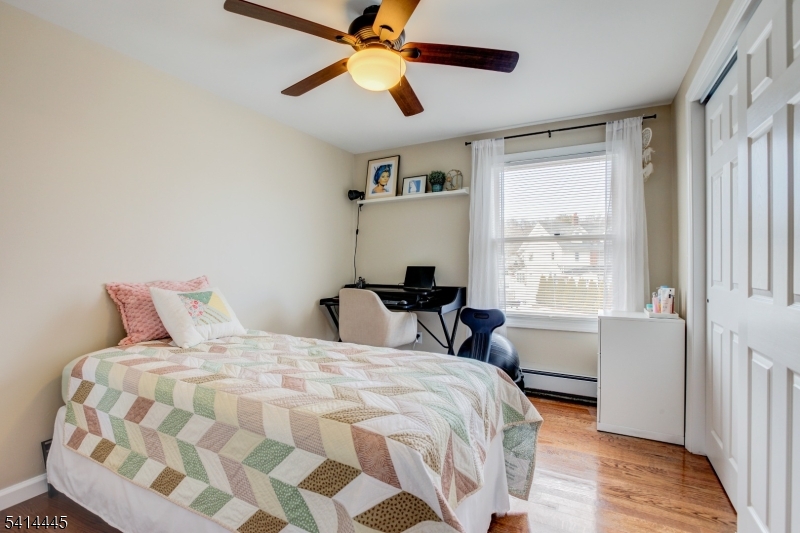 46 Walnut Street Pompton Lakes, NJ 07442 - Photo 13 of 22 a bedroom with a bed and a window