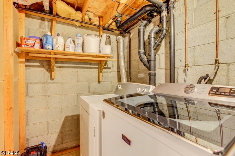 46 Walnut Street Pompton Lakes, NJ 07442 - Photo 19 of 22 a utility room with a car parked