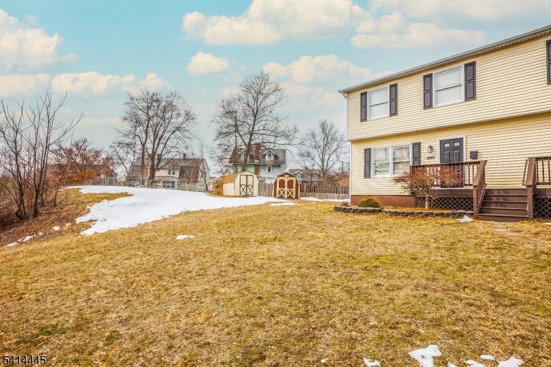 46 Walnut Street Pompton Lakes, NJ 07442 - Photo 6 of 22 a swimming pool with outdoor seating and yard